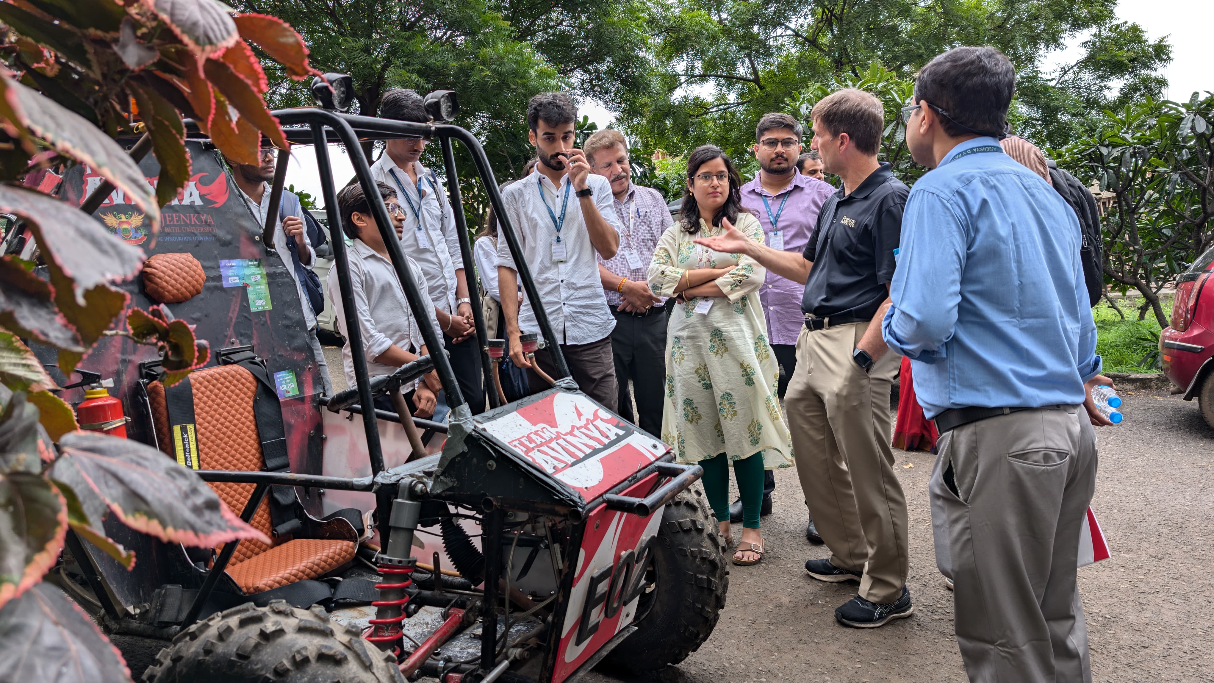 Team Avinya demonstrating electric ATV technical specifications to international delegates